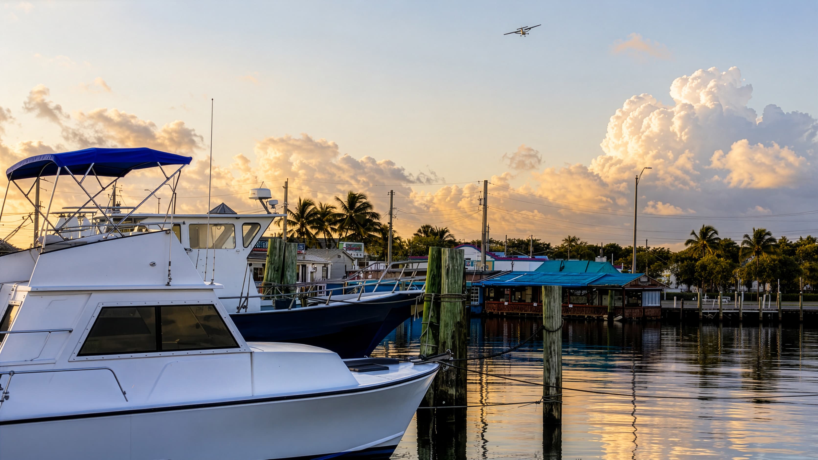Key West fishing boats docked at sunset before a charter trip
